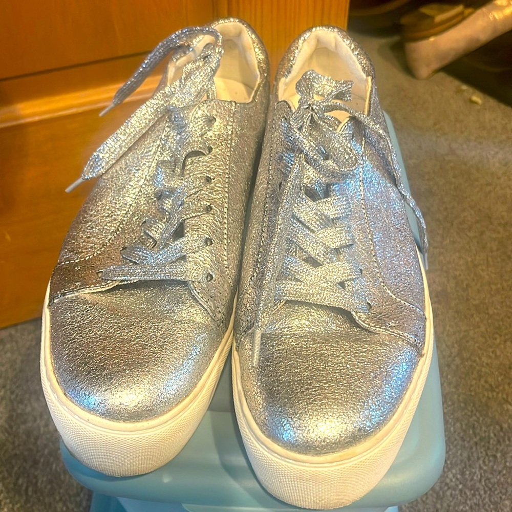 Silver trainers about 2” platform